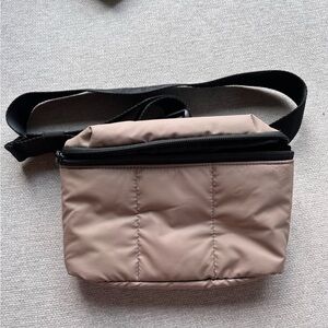 CALPAK Mini Luka Belt Bag in chocolate.